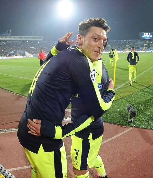 Unstoppable Arsenal Duo: Ozil and Sanchez Celebrate Goals in Champions League Victory over Ludogorets