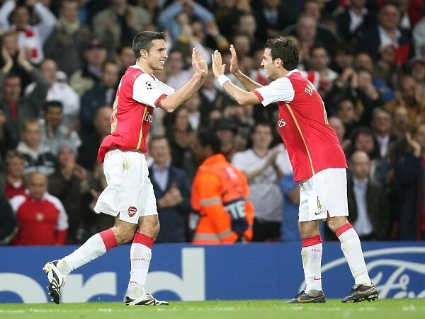 Van Persie and Fabregas: Unstoppable Duo Celebrates Arsenal's 3:0 Victory Over Sevilla in the Champions League