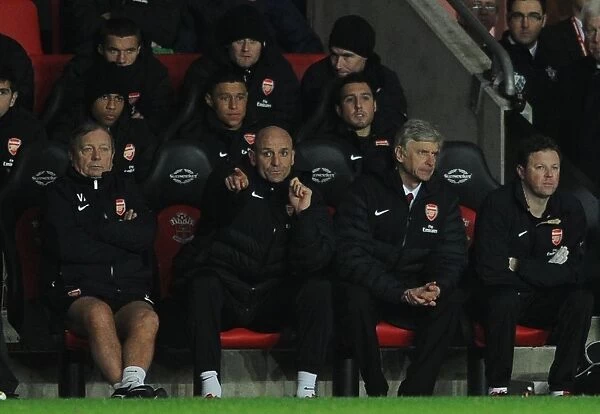Vic Akers, Steve Bould and Arsene Wenger the Arsenal Manager on the bench. Southampton 1: 1 Arsenal
