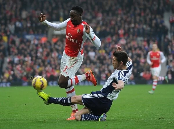 Welbeck vs Pocognoli: Intense Tackle in Arsenal's Premier League Clash with West Bromwich Albion