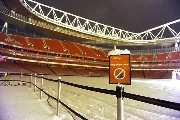 Winter's Battle at Emirates: Arsenal vs. Blackburn Rovers in a Snow-Covered Premier League