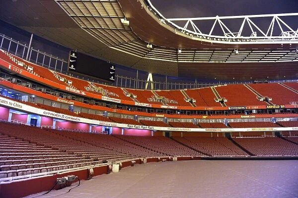 Winter's Embrace: Arsenal's Emirates Stadium Transformed by Snow