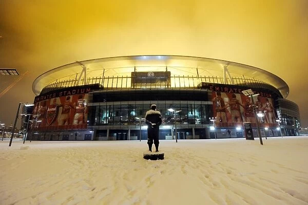 Winter's Grasp on Arsenal's Emirates Stadium: A Premier League Fortress Transformed into a Snowy Battlefield