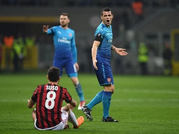 Xhaka vs. Suso: Intense Rivalry in the UEFA Europa League Clash Between AC Milan and Arsenal