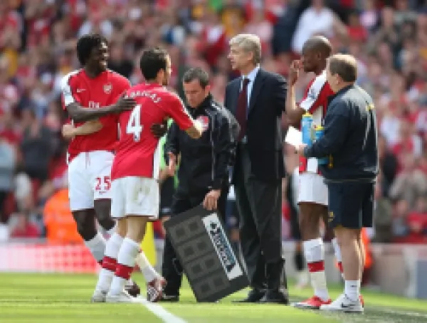 Buy Cesc Fabregas is substituted for Emmanuel Adebayor
