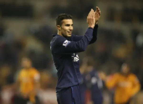 Buy Robin van Persie salutes the Arsenal fans after the match