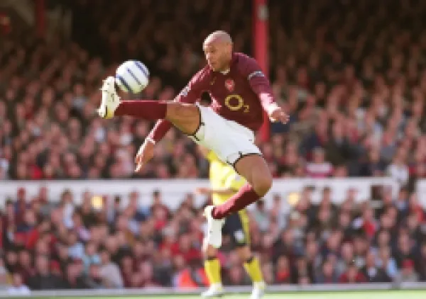 Buy Thierry Henry brings the ball down on his way to scoring his 1st, Arsenal's 2nd goal