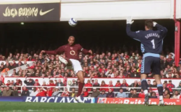 Buy Thierry Henry scores his 1st, Arsenal's 2nd goal under pressure from Thomas Sorensen (Villa)
