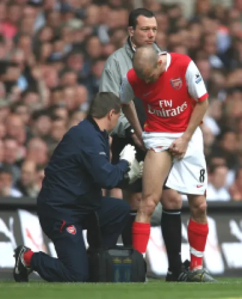 Buy Arsenal physio Gary Lewin treats Freddie Ljungberg