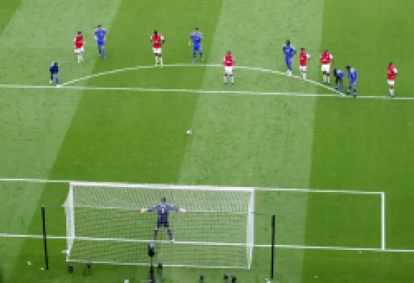 Buy Gilberto (Arsenal) waits to take his penalty