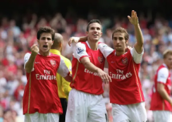 Buy Robin van Persie Cesc Fabregas and Mathieu Flamini celebrate the 2nd Arsenal goal scored by Alex Hle