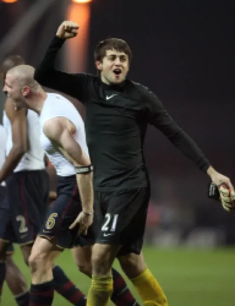 Buy Phileppe Senderos and Lukasz Fabianski (Arsenal) celebrate at the end of the match