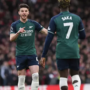 2023-24 Premier League: Bukayo Saka and Declan Rice Share Strategies on the Field during Fulham vs. Arsenal