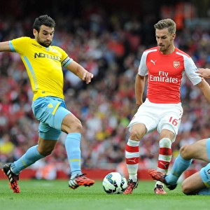 Aaron Ramsey (Arsenal) Mile Jedinak and Scott Dann (Palace). Arsenal 2: 1 Crystal Palace