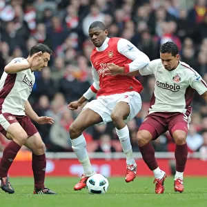 Abou Diaby (Arsenal) Kieran Richardson and Steed Malbranque (Sunderland)