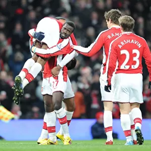 Abou Diaby celebrates scoring the 3rd Arsenal goal with Theo Walcott, Emmanuel Eboue