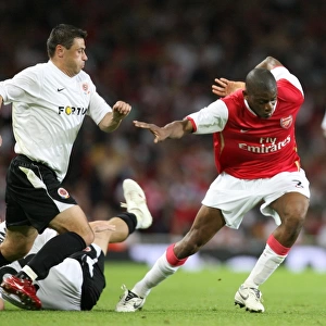Abu Diaby and Marek Kulic Clash in Arsenal's 3-0 Victory over Sparta Prague in the UEFA Champions League