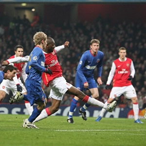Abu Diaby shoots past Bucuresti keeper Robinson Zapata to score the 1st Arsenal goal