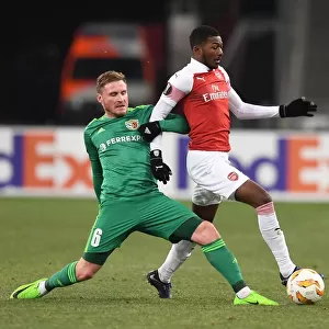 Ainsley Maitland-Niles vs. Oleksandr Skliar: A Battle in the Europa League Clash between Arsenal and Vorskla Poltava