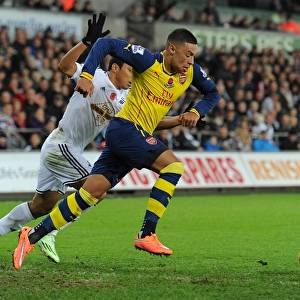 Alex Oxlade-Chamberlain Outmaneuvers Jefferson Montero in Swansea v Arsenal Premier League Clash