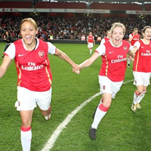 Alex Scott and Gemma Davison (Arsenal) celebrate after the match