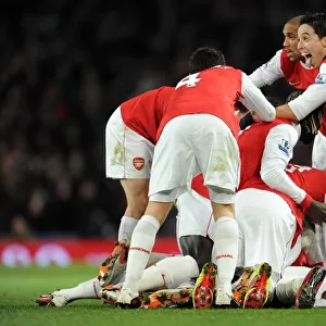 Alex Song celebrates scoring Arsenals 1st goal with his team mates including Samir Nasri