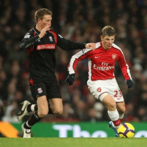 Andrey Arshavin (Arsenal) Danny Collins (Stoke). Arsenal 2: 0 Stoke City