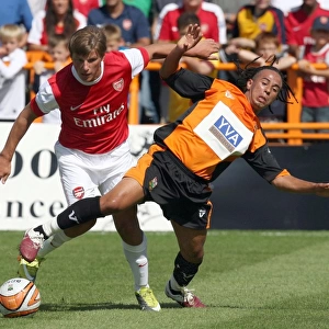 Andrey Arshavin (Arsenal) Sam Cox (Barnet). Barnet 0: 4 Arsenal. Pre Season Friendly