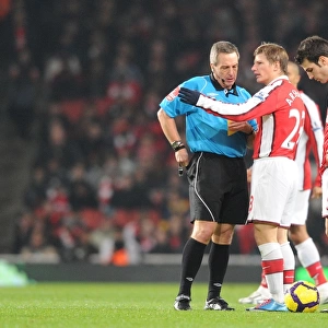 Andrey Arshavin (Arsenal) talks to referee Alan Wiley. Arsenal 4: 2 Bolton Wanderers