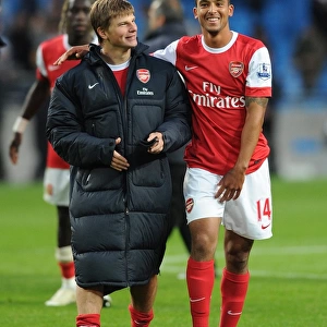 Andrey Arshavin and Theo Walcott (Arsenal) celebrate after the match. Manchester City 0