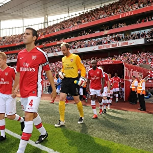Arsenal captain Cesc Fabregas leads the team out