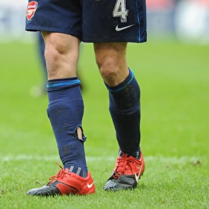 Arsenal captain Cesc Fabregas socks after a challenge from a Stoke player