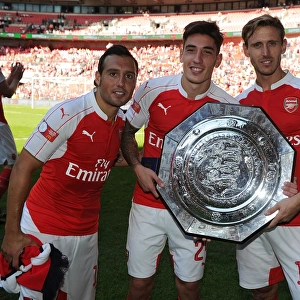 Arsenal Celebrate FA Community Shield Victory over Chelsea (2015): Santi Cazorla, Hector Bellerin, and Nacho Monreal Rejoice