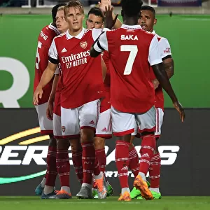 Arsenal Celebrates First Goal Against Chelsea in Florida Cup 2022-23: Martin Odegaard and Bukayo Saka Rejoice after Gabriel Jesus Score