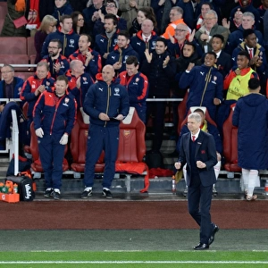 Arsenal Celebrates First Goal Against Manchester City (2015-16): Arsene Wenger and Team Rejoice on the Emirates Stadium Bench
