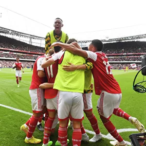 Arsenal Celebrates Third Goal Against Tottenham in 2022-23 Premier League Match