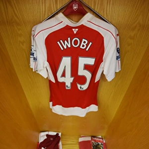 Arsenal Changing Room: A Pre-Match Glance at Alex Iwobi's Jersey (Arsenal vs. Watford, 2015-16)