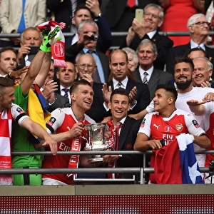 Arsenal FA Cup Victory: Per Mertesacker and Laurent Koscielny Celebrate with the Trophy after Beating Chelsea 2-1