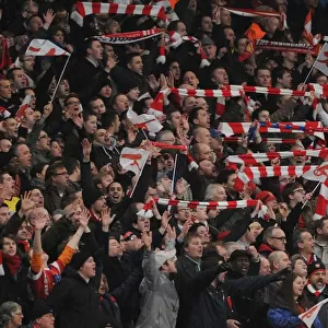 Arsenal fans celebrate. Arsenal 2: 1 Barcelona, UEFA Champions League, Emirates Stadium