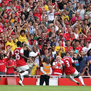 Arsenal fans celebrate Bacary Sagnas 2nd goal. Arsenal 3: 2 Celtic