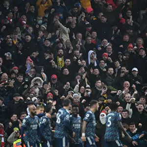 Arsenal Fans Celebrate First Goal Against Norwich City in Premier League Match, 2021-22
