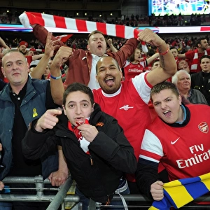 Arsenal fans celebrate after the match. Arsenal 1: 1 Wigan Athletic. 4: 2 after penalties