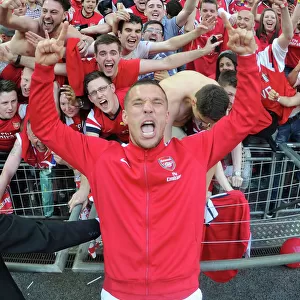 Arsenal FC: Celebrating FA Cup Victory with Lukas Podolski and Fans at Wembley Stadium