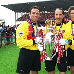 Arsenal goalkeepers Richard Wright, David Seaman and Stuart Taylor lift the F. A