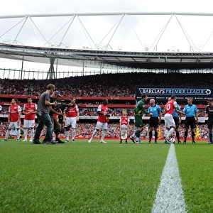 Arsenal and Liverpool line up before the match. Arsenal 0: 2 Liverpool. Barclays Premier League
