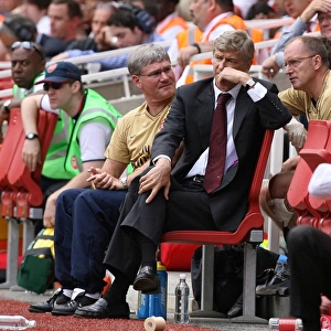 Arsenal manager Arsene Wenger and assistant Pat Rice