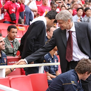 Arsenal manager Arsene Wenger with Cesc Fabregas