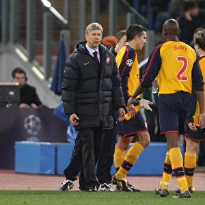 Arsenal manager Arsene Wenger talks with Abou Diaby