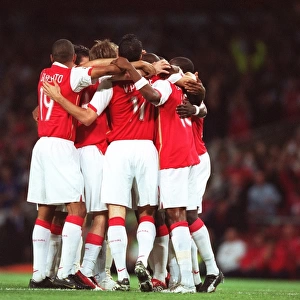 The Arsenal players celebrate the 2nd goal scored by Alex Hleb