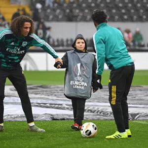 Arsenal Players Engage with Ballboy Before Vitoria Guimaraes Clash in Europa League
